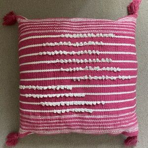 Two pink and white pillows, includes inserts